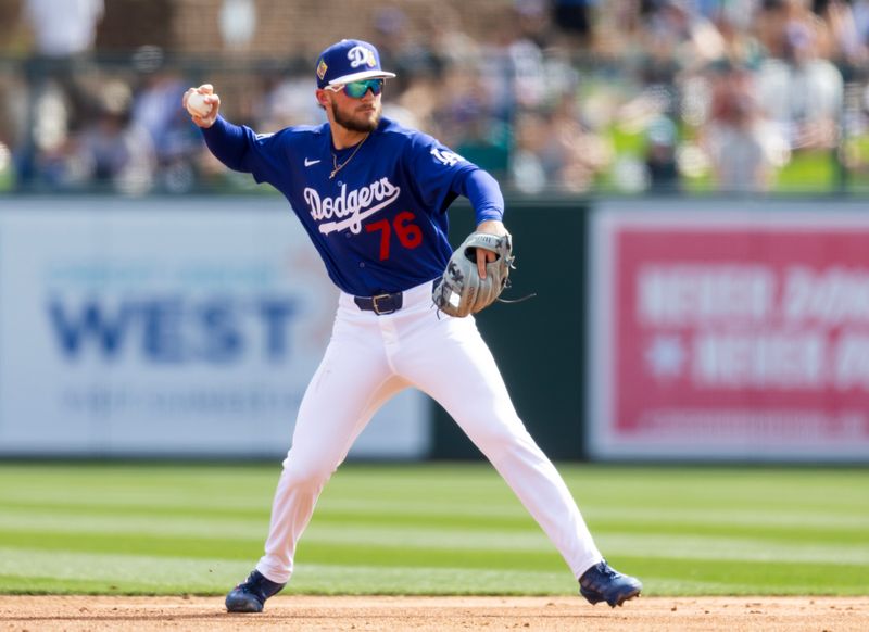 Feb 23, 2026; Phoenix, Arizona, USA; Los Angeles Dodgers infielder Alex Freeland against the Seattle Mariners during a spring training game at Camelback Ranch-Glendale. Mandatory Credit: Mark J. Rebilas-Imagn Images