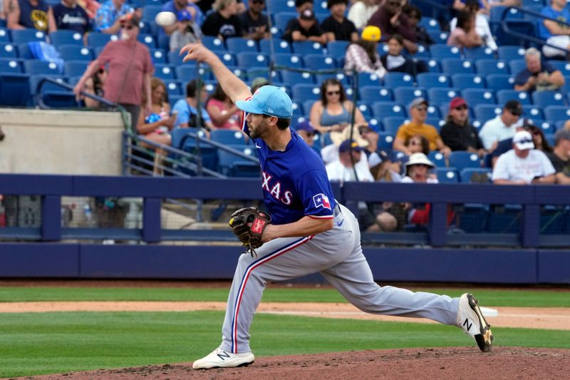 Mar 16, 2024; Phoenix, Arizona, USA; Texas Rangers pitcher Austin Pruitt (49) throws against the Milwaukee Brewers in the fourth inning at American Family Fields of Phoenix. Mandatory Credit: Rick Scuteri-USA TODAY Sports