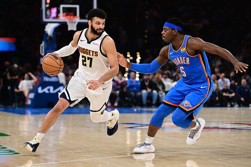 OKLAHOMA CITY, OKLAHOMA - JANUARY 31: Jamal Murray #27 of the Denver Nuggets handles the ball in front of Luguentz Dort #5 of the Oklahoma City Thunder during the second half at Paycom Center on January 31, 2024 in Oklahoma City, Oklahoma. NOTE TO USER: User expressly acknowledges and agrees that, by downloading and or using this Photograph, user is consenting to the terms and conditions of the Getty Images License Agreement. (Photo by Joshua Gateley/Getty Images)