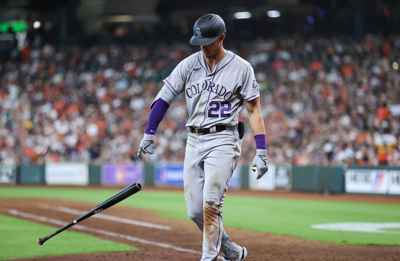 Jul 4, 2023; Houston, Texas, USA; Colorado Rockies right fielder Nolan Jones (22) throws down his bat after striking out during the seventh inning against the Houston Astros at Minute Maid Park. Mandatory Credit: Troy Taormina-USA TODAY Sports