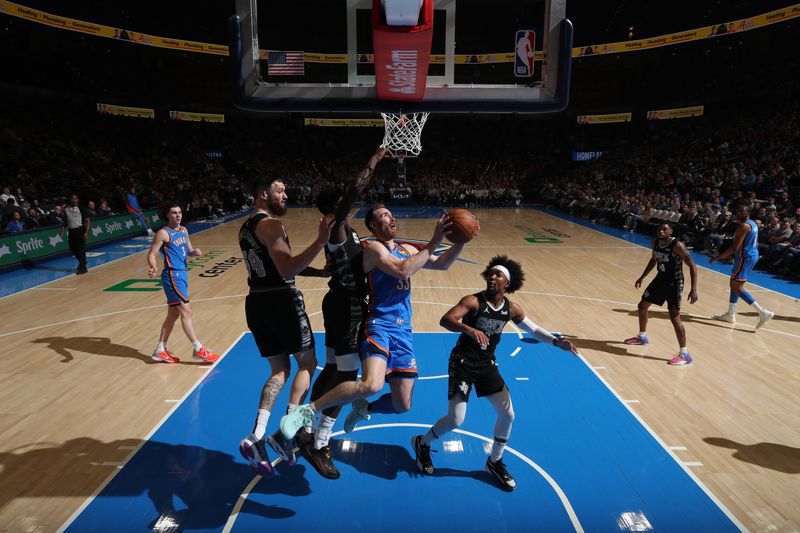 OKLAHOMA CITY, OK - APRIL 10:  Gordon Hayward #33 of the Oklahoma City Thunder drives to the basket during the game again the San Antonio Spurs on April 10, 2024 at Paycom Arena in Oklahoma City, Oklahoma. NOTE TO USER: User expressly acknowledges and agrees that, by downloading and or using this photograph, User is consenting to the terms and conditions of the Getty Images License Agreement. Mandatory Copyright Notice: Copyright 2024 NBAE (Photo by Zach Beeker/NBAE via Getty Images)