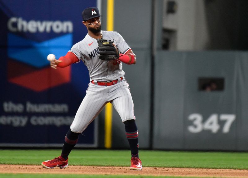 Sep 30, 2023; Denver, Colorado, USA; Minnesota Twins shortstop Willi Castro (50) throws to second base for a force out in the third inning against the Colorado Rockies at Coors Field. Mandatory Credit: John Leyba-USA TODAY Sports