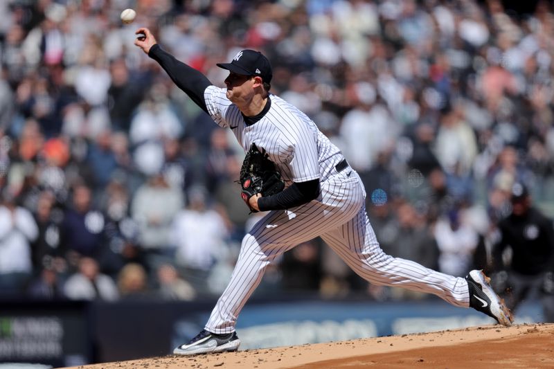 Mar 30, 2023; Bronx, New York, USA; New York Yankees starting pitcher Gerrit Cole (45) pitches against the San Francisco Giants during the first inning at Yankee Stadium. Mandatory Credit: Brad Penner-USA TODAY Sports