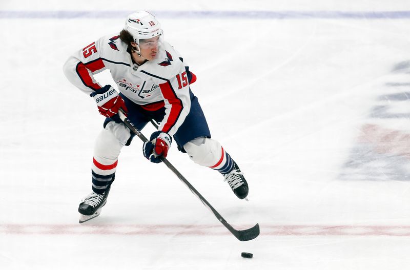 Mar 7, 2024; Pittsburgh, Pennsylvania, USA; Washington Capitals left wing Sonny Milano (15) skates with the puck against the Pittsburgh Penguins during the third period at PPG Paints Arena. The Capitals shutout the Penguins 6-0. Mandatory Credit: Charles LeClaire-USA TODAY Sports