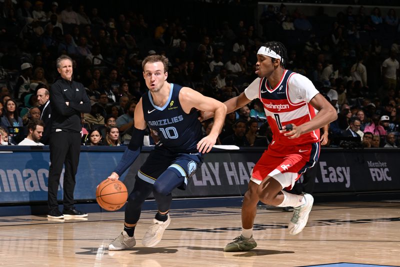 MEMPHIS, TN - NOVEMBER 8: Luke Kennard #10 of the Memphis Grizzlies handles the ball during the game against the Washington Wizards on November 8, 2024 at FedExForum in Memphis, Tennessee. NOTE TO USER: User expressly acknowledges and agrees that, by downloading and or using this photograph, User is consenting to the terms and conditions of the Getty Images License Agreement. Mandatory Copyright Notice: Copyright 2024 NBAE (Photo by Grant Burke/NBAE via Getty Images)