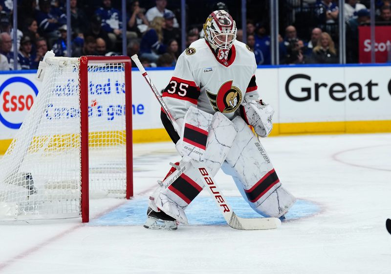 Apr 29, 2025; Toronto, Ontario, CAN; Ottawa Senators goaltender Linus Ullmark (35) follows the play against the Toronto Maple Leafs in the third period during game five of the first round of the 2025 Stanley Cup Playoffs at Scotiabank Arena. Mandatory Credit: Nick Turchiaro-Imagn Images