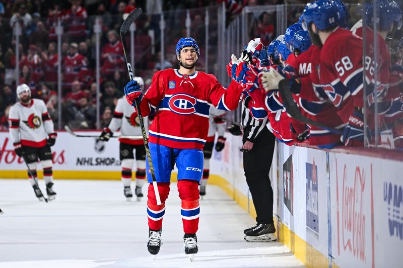 Jan 23, 2024; Montreal, Quebec, CAN; Montreal Canadiens defenseman Johnathan Kovacevic (26) celebrate his goal against the Ottawa Senators with his teammates at the bench during the third period at Bell Centre. Mandatory Credit: David Kirouac-USA TODAY Sports