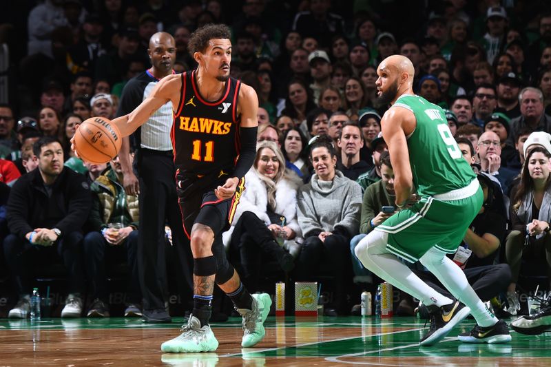 BOSTON, MA - FEBRUARY 7: Trae Young #11 of the Atlanta Hawks dribbles the ball during the game against the Boston Celtics on February 7, 2024 at the TD Garden in Boston, Massachusetts. NOTE TO USER: User expressly acknowledges and agrees that, by downloading and or using this photograph, User is consenting to the terms and conditions of the Getty Images License Agreement. Mandatory Copyright Notice: Copyright 2024 NBAE  (Photo by Brian Babineau/NBAE via Getty Images)