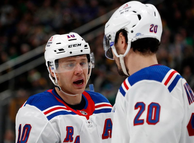 Mar 16, 2024; Pittsburgh, Pennsylvania, USA;  New York Rangers left wing Artemi Panarin (10) talks to left wing Chris Kreider (20) against the Pittsburgh Penguins during the second period at PPG Paints Arena. Mandatory Credit: Charles LeClaire-USA TODAY Sports