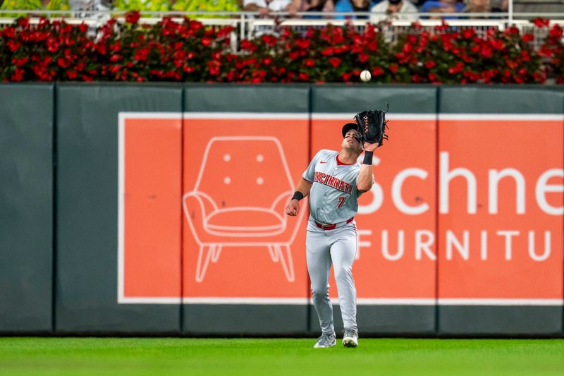 Sep 13, 2024; Minneapolis, Minnesota, USA; Cincinnati Reds left fielder Spencer Steer (7) catches a fly ball against the Minnesota Twins in the fourth inning at Target Field. Mandatory Credit: Jesse Johnson-Imagn Images