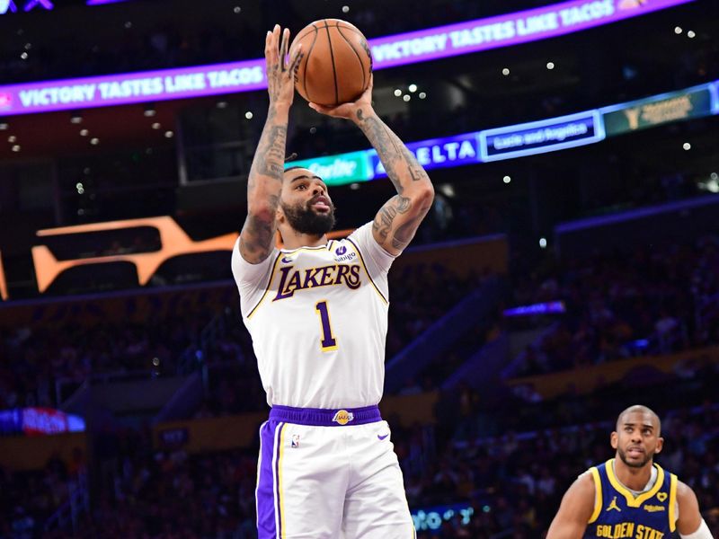 LOS ANGELES, CA - MACH 16: D'Angelo Russell #1 of the Los Angeles Lakers shoots the ball during the game against the Golden State Warriors on March 16, 2024 at Crypto.Com Arena in Los Angeles, California. NOTE TO USER: User expressly acknowledges and agrees that, by downloading and/or using this Photograph, user is consenting to the terms and conditions of the Getty Images License Agreement. Mandatory Copyright Notice: Copyright 2024 NBAE (Photo by Adam Pantozzi/NBAE via Getty Images)