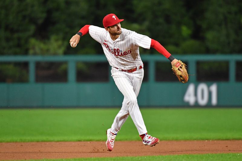 Sep 24, 2023; Philadelphia, Pennsylvania, USA; Philadelphia Phillies shortstop Trea Turner (7) throws to first base during the ninth inning against the New York Mets at Citizens Bank Park. Mandatory Credit: Eric Hartline-USA TODAY Sports