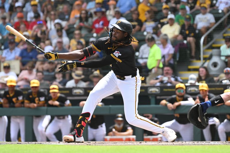 Mar 25, 2024; Bradenton, Florida, USA; Pittsburgh Pirates shortstop Oniel Cruz (15) strikes out in the first inning of the spring training game against the Toronto Blue Jays at LECOM Park. Mandatory Credit: Jonathan Dyer-USA TODAY Sports