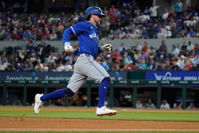 Sep 19, 2024; Arlington, Texas, USA; Toronto Blue Jays third baseman Ernie Clement (28) runs towards home plate during the fourth inning against the Texas Rangers at Globe Life Field. Mandatory Credit: Raymond Carlin III-Imagn Images