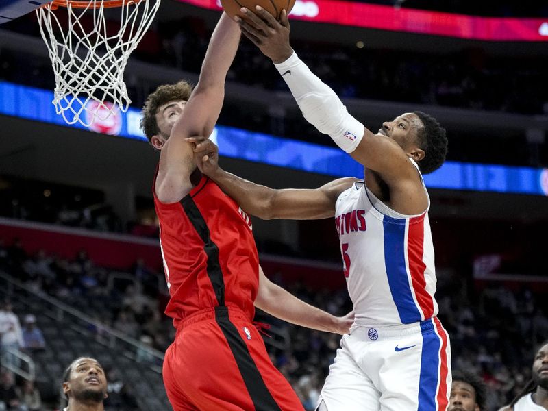 DETROIT, MICHIGAN - NOVEMBER 10: Alperen Sengun #28 of the Houston Rockets blocks a shot attempt by Malik Beasley #5 of the Detroit Pistons during the second quarter at Little Caesars Arena on November 10, 2024 in Detroit, Michigan. NOTE TO USER: User expressly acknowledges and agrees that, by downloading and or using this photograph, User is consenting to the terms and conditions of the Getty Images License Agreement. (Photo by Nic Antaya/Getty Images)