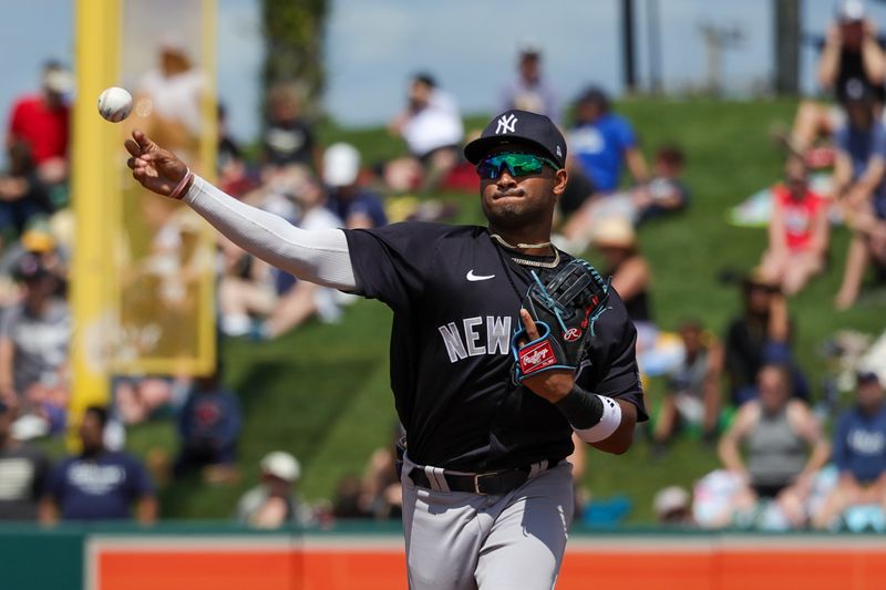 Mar 23, 2024; Lakeland, Florida, USA; New York Yankees shortstop Roderick Arias (54) throws to first during the first inning against the Detroit Tigers at Publix Field at Joker Marchant Stadium. Mandatory Credit: Mike Watters-USA TODAY Sports