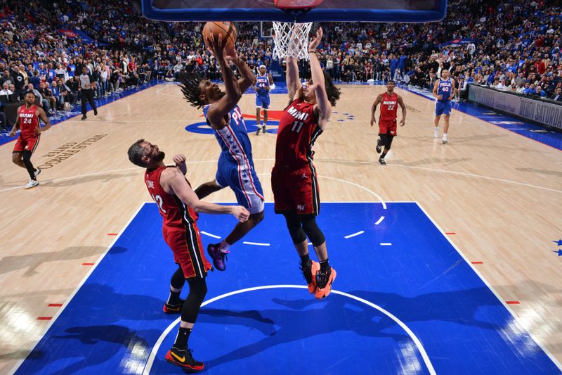 PHILADELPHIA, PA - APRIL 17: Tyrese Maxey #0 of the Philadelphia 76ers drives to the basket during the game against the Miami Heat during the 2024 NBA Play-In Tournament on April 17, 2024 at the Wells Fargo Center in Philadelphia, Pennsylvania NOTE TO USER: User expressly acknowledges and agrees that, by downloading and/or using this Photograph, user is consenting to the terms and conditions of the Getty Images License Agreement. Mandatory Copyright Notice: Copyright 2024 NBAE (Photo by Jesse D. Garrabrant/NBAE via Getty Images)