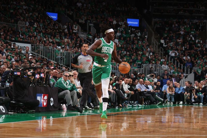 BOSTON, MA - OCTOBER 22: Jrue Holiday #4 of the Boston Celtics dribbles the ball during the game against the New York Knicks on October 22, 2024 at TD Garden in Boston, Massachusetts. NOTE TO USER: User expressly acknowledges and agrees that, by downloading and or using this Photograph, user is consenting to the terms and conditions of the Getty Images License Agreement. Mandatory Copyright Notice: Copyright 2024 NBAE (Photo by Nathaniel S. Butler/NBAE via Getty Images)