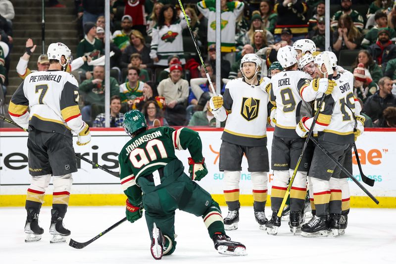 Apr 3, 2023; Saint Paul, Minnesota, USA; Vegas Golden Knights left wing Pavel Dorofeyev (16) celebrates his goal with teammates during the third period against the Minnesota Wild at Xcel Energy Center. Mandatory Credit: Matt Krohn-USA TODAY Sports