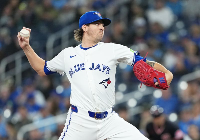 May 3, 2025; Toronto, Ontario, CAN; Toronto Blue Jays starting pitcher Kevin Gausman (34) throws pitch against the Cleveland Guardians during the first inning at Rogers Centre. Mandatory Credit: Nick Turchiaro-Imagn Images