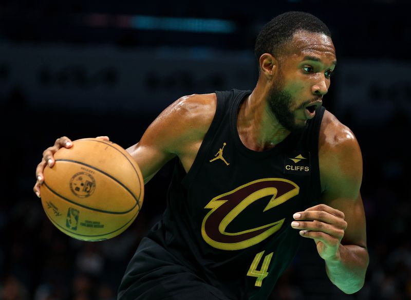 CHARLOTTE, NORTH CAROLINA - MARCH 27: Evan Mobley #4 of the Cleveland Cavaliers drives to the basket during the second half of the game against the Charlotte Hornets at Spectrum Center on March 27, 2024 in Charlotte, North Carolina. NOTE TO USER: User expressly acknowledges and agrees that, by downloading and or using this photograph, User is consenting to the terms and conditions of the Getty Images License Agreement. (Photo by Jared C. Tilton/Getty Images)