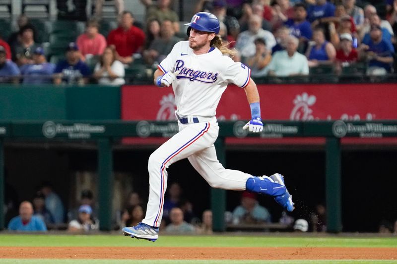 Jun 29, 2023; Arlington, Texas, USA; Texas Rangers left fielder Travis Jankowski (16) runs to second base during the fifth inning against the Detroit Tigers at Globe Life Field. Mandatory Credit: Raymond Carlin III-USA TODAY Sports