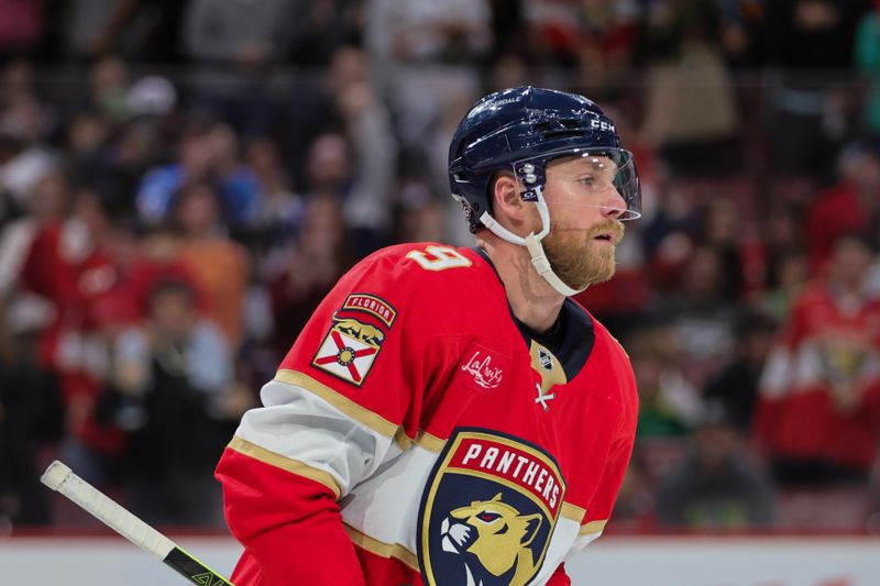 Oct 22, 2024; Sunrise, Florida, USA; Florida Panthers center Sam Bennett (9) looks on after scoring against the Minnesota Wild during the second period at Amerant Bank Arena. Mandatory Credit: Sam Navarro-Imagn Images