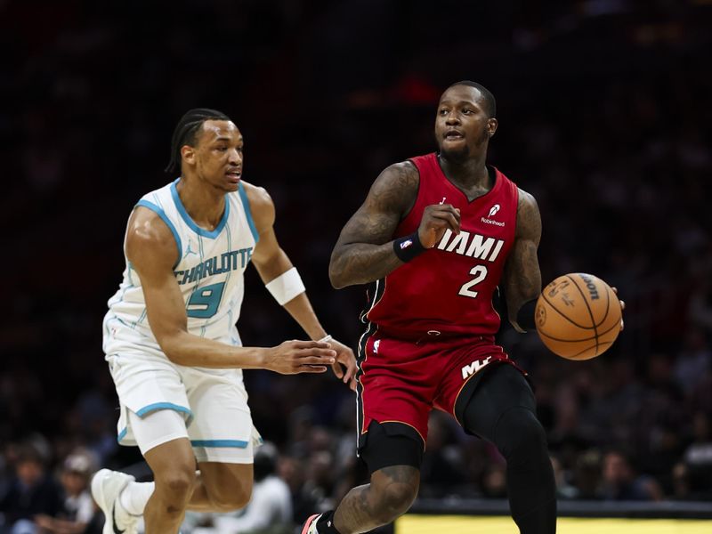 MIAMI, FLORIDA - MARCH 10: Terry Rozier #2 of the Miami Heat dribbles the ball up the court during the first quarter against the Charlotte Hornets at Kaseya Center on March 10, 2025 in Miami, Florida. NOTE TO USER: User expressly acknowledges and agrees that, by downloading and or using this photograph, User is consenting to the terms and conditions of the Getty Images License Agreement. (Photo by Brennan Asplen/Getty Images)