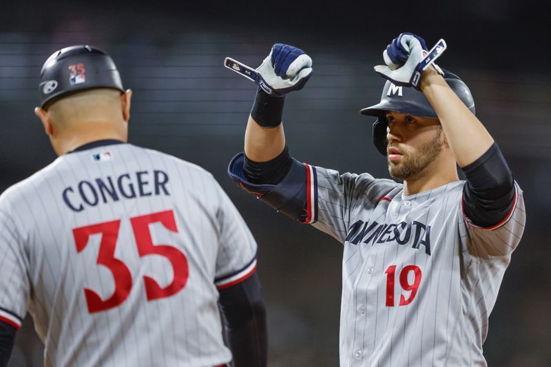 Sep 15, 2023; Chicago, Illinois, USA; Minnesota Twins first baseman Alex Kirilloff (19) celebrates after hitting a single against the Chicago White Sox during the fourth inning at Guaranteed Rate Field. Mandatory Credit: Kamil Krzaczynski-USA TODAY Sports