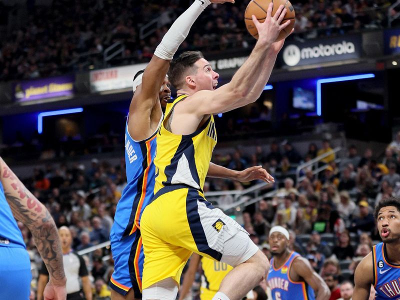 INDIANAPOLIS, INDIANA - MARCH 31: T.J. McConnell #9 of the Indiana Pacers against the Oklahoma City Thunder at Gainbridge Fieldhouse on March 31, 2023 in Indianapolis, Indiana.    NOTE TO USER: User expressly acknowledges and agrees that, by downloading and/or using this photograph, User is consenting to the terms and conditions of the Getty Images License Agreement. (Photo by Andy Lyons/Getty Images)