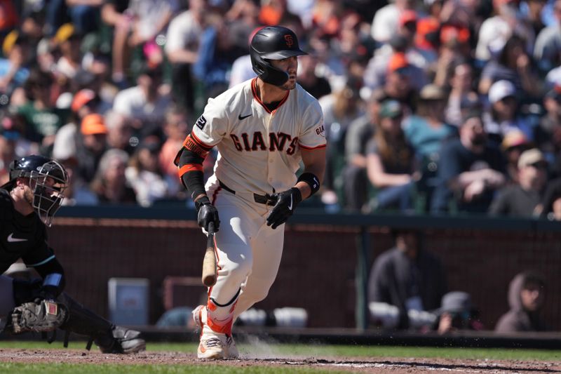 Apr 20, 2024; San Francisco, California, USA; San Francisco Giants left fielder Michael Conforto (8) hits an RBI single against the Arizona Diamondbacks during the eighth inning at Oracle Park. Mandatory Credit: Darren Yamashita-USA TODAY Sports