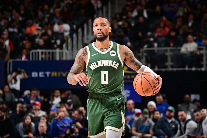 DETROIT, MI - JANUARY 22: Damian Lillard #0 of the Milwaukee Bucks dribbles the ball during the game against the Detroit Pistons on January 22, 2024 at Little Caesars Arena in Detroit, Michigan. NOTE TO USER: User expressly acknowledges and agrees that, by downloading and/or using this photograph, User is consenting to the terms and conditions of the Getty Images License Agreement. Mandatory Copyright Notice: Copyright 2024 NBAE (Photo by Chris Schwegler/NBAE via Getty Images)