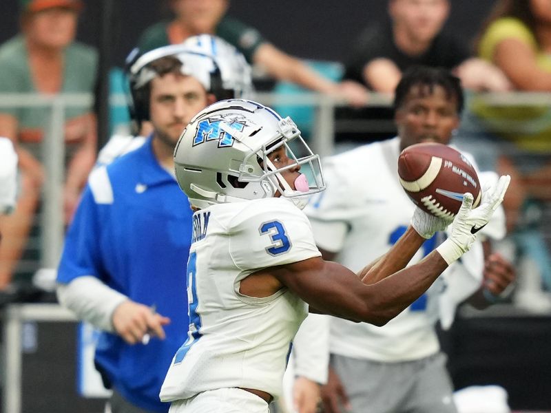 Sep 24, 2022; Miami Gardens, Florida, USA; Middle Tennessee Blue Raiders wide receiver DJ England-Chisolm (3) makes a catch before running for a touchdown against the Miami Hurricanes during the second half at Hard Rock Stadium. Mandatory Credit: Jasen Vinlove-USA TODAY Sports