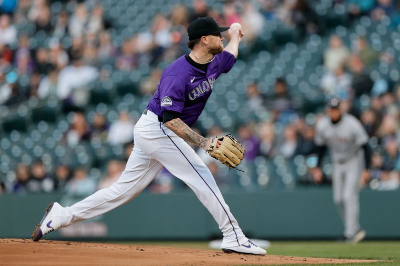 Apr 8, 2024; Denver, Colorado, USA; Colorado Rockies starting pitcher Kyle Freeland (21) pitches in the first inning against the Arizona Diamondbacks at Coors Field. Mandatory Credit: Isaiah J. Downing-USA TODAY Sports