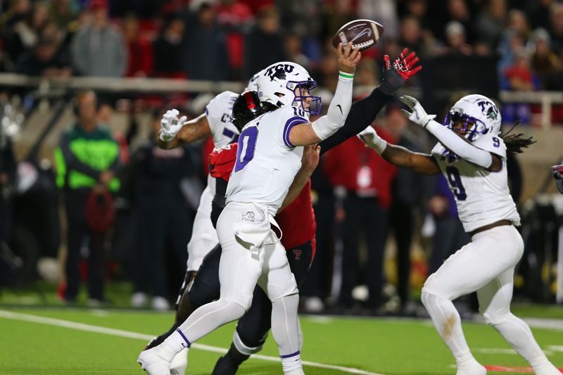 Nov 2, 2023; Lubbock, Texas, USA; Texas Christian Horned Frogs quarterback Josh Hoover (10) passes against the Texas Tech Red Raiders in the second half at Jones AT&T Stadium and Cody Campbell Field. Mandatory Credit: Michael C. Johnson-USA TODAY Sports