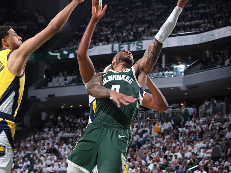 MILWAUKEE, WI - APRIL 23: Damian Lillard #0 of the Milwaukee Bucks drives to the basket during Round 1 Game 2 of the 2024 NBA Playoffs against the Indiana Pacers on April 23, 2024 at the Fiserv Forum Center in Milwaukee, Wisconsin. NOTE TO USER: User expressly acknowledges and agrees that, by downloading and or using this Photograph, user is consenting to the terms and conditions of the Getty Images License Agreement. Mandatory Copyright Notice: Copyright 2024 NBAE (Photo by Jeff Haynes/NBAE via Getty Images).