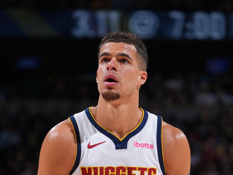 DENVER, CO - FEBRUARY 28: Michael Porter Jr. #1 of the Denver Nuggets prepares to shoot a free throw during the game against the Sacramento Kings on February 28, 2024 at the Ball Arena in Denver, Colorado. NOTE TO USER: User expressly acknowledges and agrees that, by downloading and/or using this Photograph, user is consenting to the terms and conditions of the Getty Images License Agreement. Mandatory Copyright Notice: Copyright 2024 NBAE (Photo by Garrett Ellwood/NBAE via Getty Images)