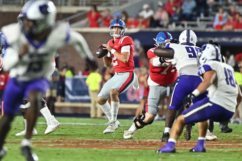 Sep 10, 2022; Oxford, Mississippi, USA; Ole Miss Rebels quarterback Jaxson Dart (2) drops back to pass against the Central Arkansas Bears during the third quarter at Vaught-Hemingway Stadium. Mandatory Credit: Matt Bush-USA TODAY Sports