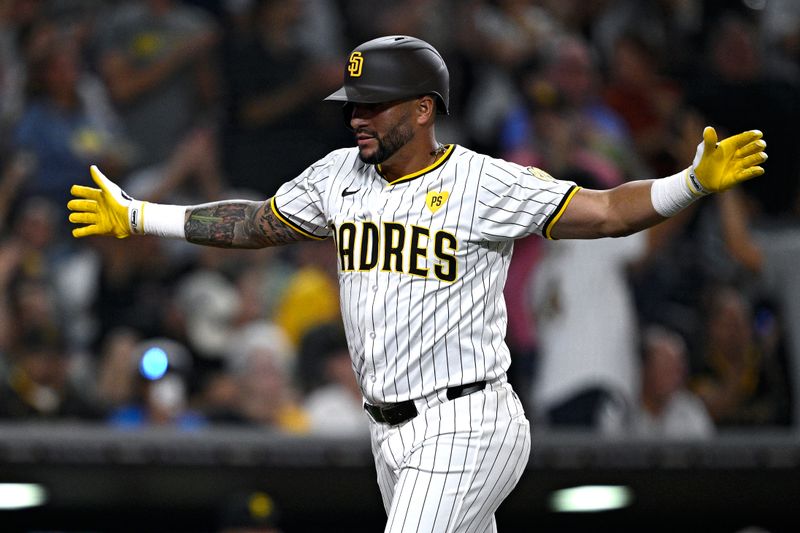 Aug 13, 2024; San Diego, California, USA; San Diego Padres right fielder David Peralta (24) celebrates after hitting a home run against the Pittsburgh Pirates during the fifth inning at Petco Park. Mandatory Credit: Orlando Ramirez-USA TODAY Sports