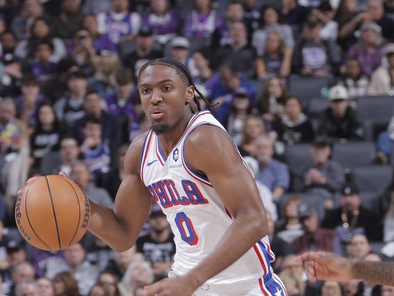 SACRAMENTO, CA - JANUARY 1:  Tyrese Maxey #0 of the Philadelphia 76ers dribbles the ball during the game against the Sacramento Kings on January 1, 2025 at Golden 1 Center in Sacramento, California. NOTE TO USER: User expressly acknowledges and agrees that, by downloading and or using this Photograph, user is consenting to the terms and conditions of the Getty Images License Agreement. Mandatory Copyright Notice: Copyright 2025 NBAE (Photo by Rocky Widner/NBAE via Getty Images)