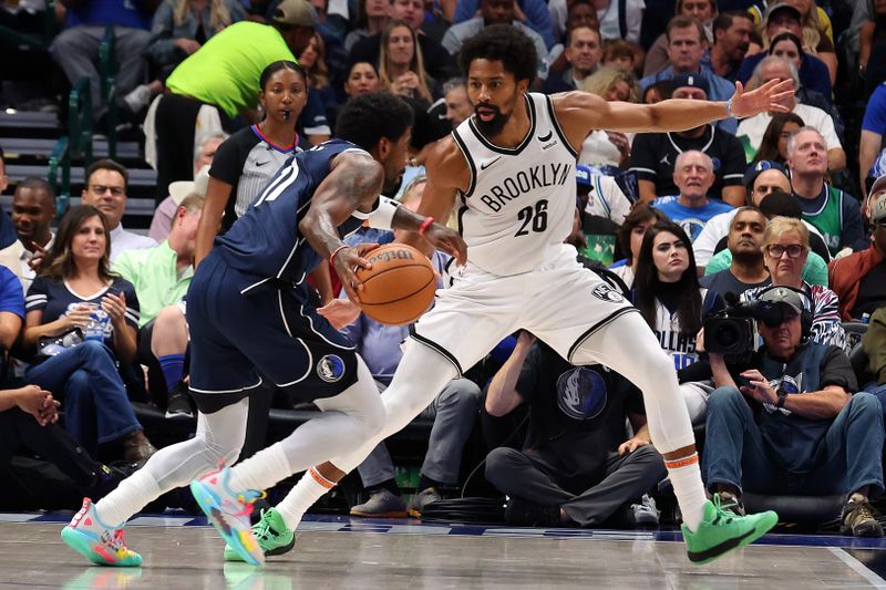 DALLAS, TEXAS - OCTOBER 27: Kyrie Irving #11 of the Dallas Mavericks is guarded by Spencer Dinwiddie #26 of the Brooklyn Nets in the fourth quarter at American Airlines Center on October 27, 2023 in Dallas, Texas. NOTE TO USER: User expressly acknowledges and agrees that, by downloading and or using this photograph, User is consenting to the terms and conditions of the Getty Images License Agreement. (Photo by Richard Rodriguez/Getty Images)