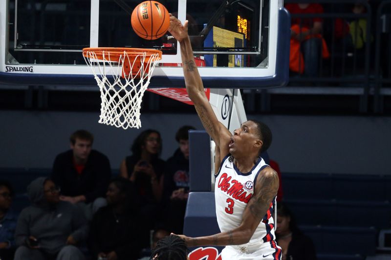 Dec 5, 2023; Oxford, Mississippi, USA; Mississippi Rebels forward Jamarion Sharp (3) dunks during the second half against the Mount St. Mary's Mountaineers at The Sandy and John Black Pavilion at Ole Miss. Mandatory Credit: Petre Thomas-USA TODAY Sports