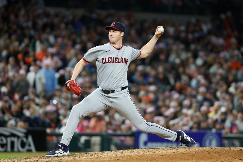 May 24, 2025; Detroit, Michigan, USA; Cleveland Guardians pitcher Tim Herrin (29) throws during the tenth inning against the Detroit Tigers at Comerica Park. Mandatory Credit: Brian Bradshaw Sevald-Imagn Images