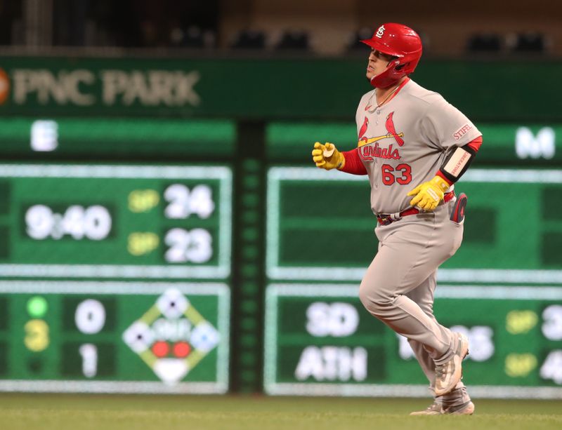 Apr 7, 2025; Pittsburgh, Pennsylvania, USA;  St. Louis Cardinals catcher Yohel Pozo (63) circles the bases on a solo home run against the Pittsburgh Pirates during the sixth inning at PNC Park. Mandatory Credit: Charles LeClaire-Imagn Images