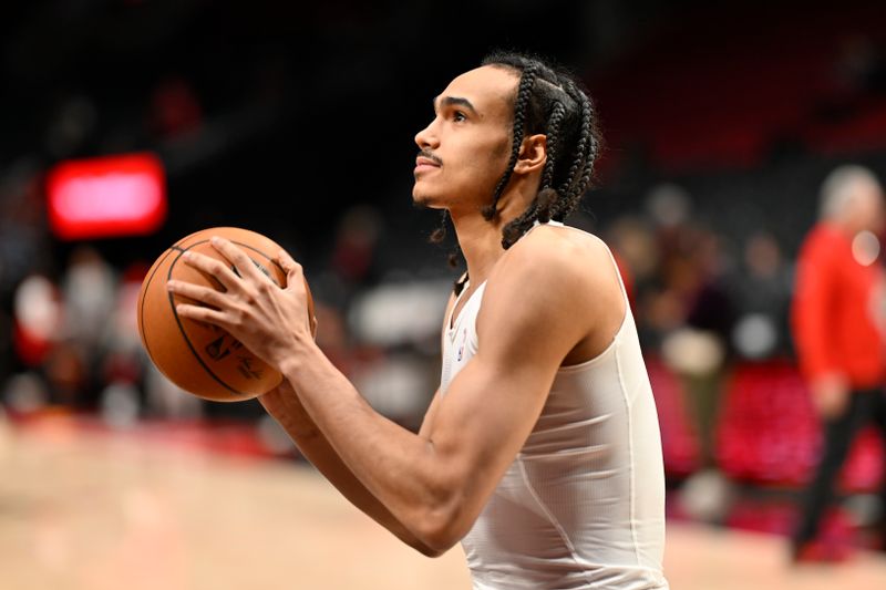 PORTLAND, OREGON - MARCH 09: Dalano Banton #5 of the Portland Trail Blazers warms up before the game against the Toronto Raptors at the Moda Center on March 09, 2024 in Portland, Oregon. NOTE TO USER: User expressly acknowledges and agrees that, by downloading and or using this photograph, User is consenting to the terms and conditions of the Getty Images License Agreement. (Photo by Alika Jenner/Getty Images)