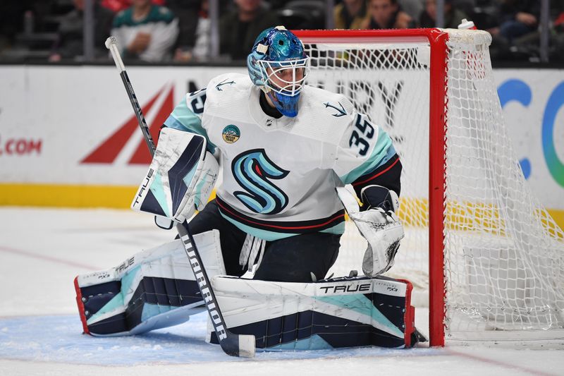 Dec 23, 2023; Anaheim, California, USA; Seattle Kraken goaltender Joey Daccord (35) defends the goal against the Anaheim Ducks during the second period at Honda Center. Mandatory Credit: Gary A. Vasquez-USA TODAY Sports