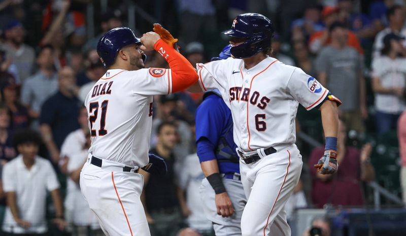 May 17, 2023; Houston, Texas, USA; Houston Astros center fielder Jake Meyers (6) celebrates with catcher Yainer Diaz (21) after hitting a home run during the ninth inning against the Chicago Cubs at Minute Maid Park. Mandatory Credit: Troy Taormina-USA TODAY Sports