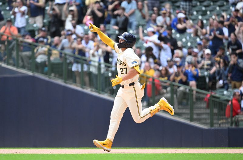 May 1, 2024; Milwaukee, Wisconsin, USA; Milwaukee Brewers shortstop Willy Adames (27) rounds the bases after hitting a home run against the Tampa Bay Rays in the sixth inning at American Family Field. Mandatory Credit: Michael McLoone-USA TODAY Sports