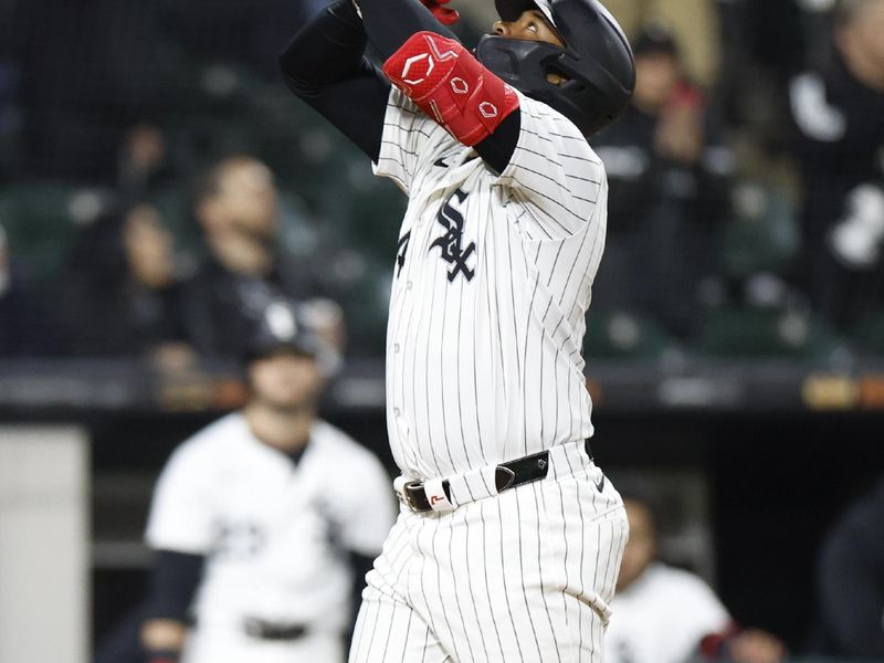 Apr 26, 2024; Chicago, Illinois, USA; Chicago White Sox designated hitter Eloy Jimenez (74) crosses home plate after hitting a two-run home run against the Tampa Bay Rays during the seventh inning at Guaranteed Rate Field. Mandatory Credit: Kamil Krzaczynski-USA TODAY Sports