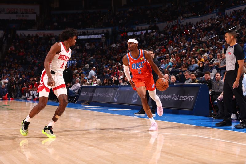 OKLAHOMA CITY, OK - FEBRUARY 27: Shai Gilgeous-Alexander #2 of the Oklahoma City Thunder dribbles the ball during the game against the Houston Rockets on February, 2024 at Paycom Arena in Oklahoma City, Oklahoma. NOTE TO USER: User expressly acknowledges and agrees that, by downloading and or using this photograph, User is consenting to the terms and conditions of the Getty Images License Agreement. Mandatory Copyright Notice: Copyright 2024 NBAE (Photo by Zach Beeker/NBAE via Getty Images)